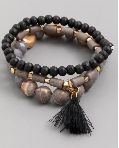 Bracelet multi layer with tassel