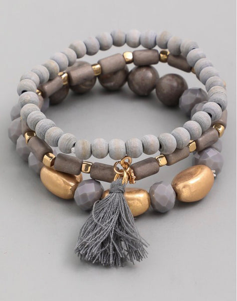 Bracelet multi layer with tassel