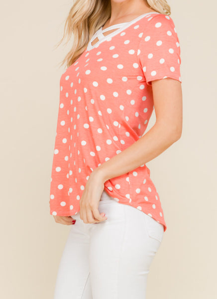 Coral polka dot crisscross detail top