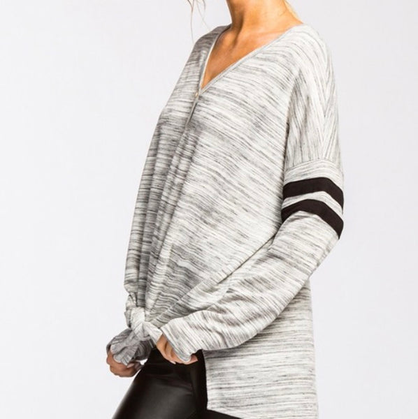 Heather gray front tie top with black striped detail on sleeve