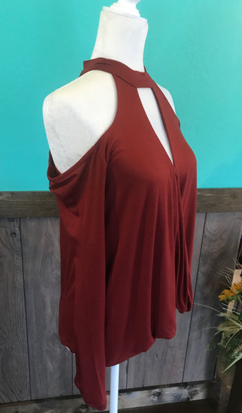 Cold shoulder high neck top in spicy rust