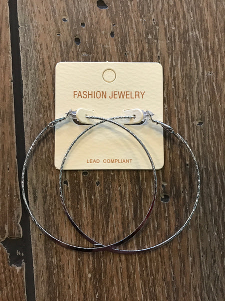 Earrings large textured hoop