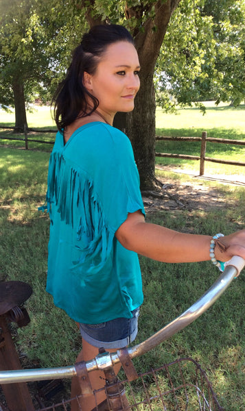 short sleeve dark jade top with fringe detail